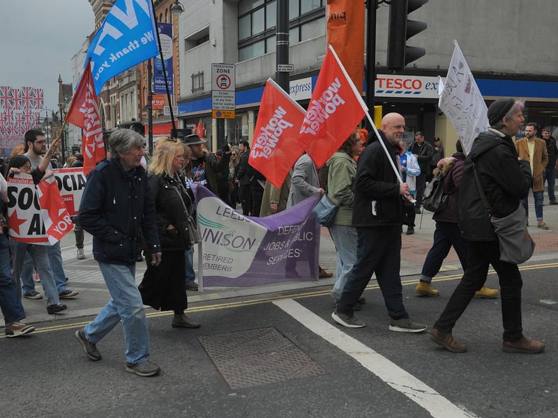 Campaigners held banners for Unison, Workers' Power and the NHS in the show of support for those on strike. Picture: Steve Riding.