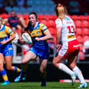 Ella Donnelly on the ball for Leeds Rhinos against St Helens. Picture by Olly Hassell/SWpix.com.
