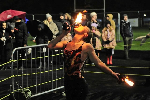 Daniella Chapman is pictured fire eating.