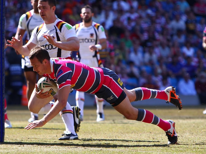 Danny McGuire scored five tries as Rhinos easily maintained their Magic hoodoo over Bulls.