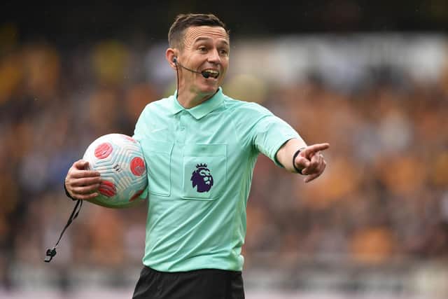 WOLVERHAMPTON, ENGLAND - MAY 15: Referee Tony Harrington gestures during the Premier League match between Wolverhampton Wanderers and Norwich City at Molineux on May 15, 2022 in Wolverhampton, England. (Photo by Nathan Stirk/Getty Images)