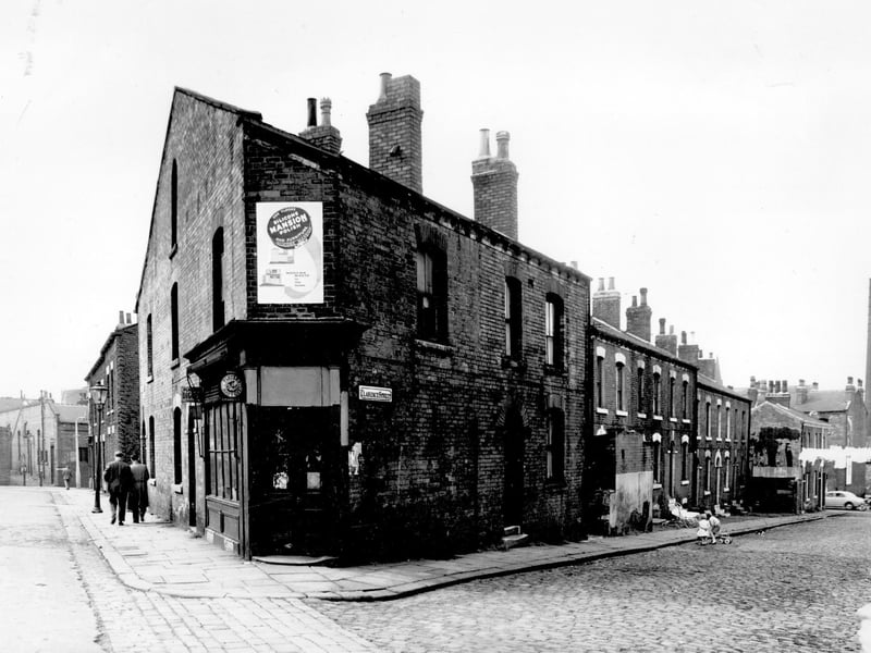 Cross Barrack Street is on the left, Clarence Street to the right, looking towards Sheepscar Street. This was to be included in the slum clearance plan for the area. Pictured in August 1958.