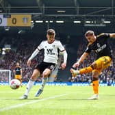 LONDON, ENGLAND - APRIL 22: Max Woeber of Leeds United shoots whilst under pressure from Harry Wilson of Fulham during the Premier League match between Fulham FC and Leeds United at Craven Cottage on April 22, 2023 in London, England. (Photo by Clive Rose/Getty Images)