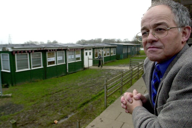 Priesthorpe School head teacher Clive Pickles looks across an area where new classrooms were going to be built in February 2003.