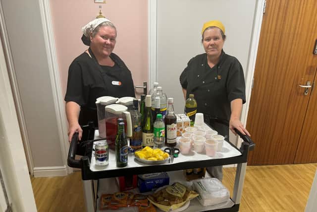 The Catering Team consisting of Teri Donnelly, Head Chef and Deborah Donnelly, Chef and Kitchen Assistant at HC-One’s Silverwood Care Home with tea trolley