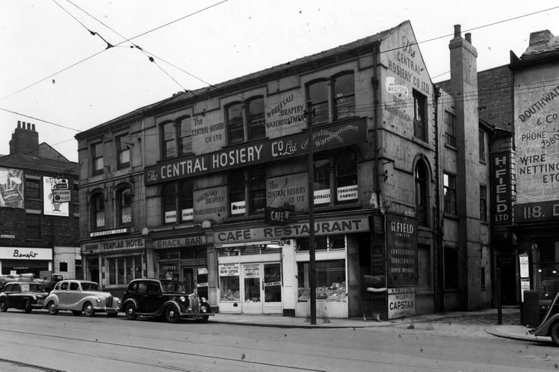 Vicar Lane in  February 1953. On the right is Douthwaite and Co, in the middle is the Central Hosiery Co Ltd with cafe and snack bar underneath. At the left on the corner of Templar Street is the Templar Hotel advertising Melbourne Ales.