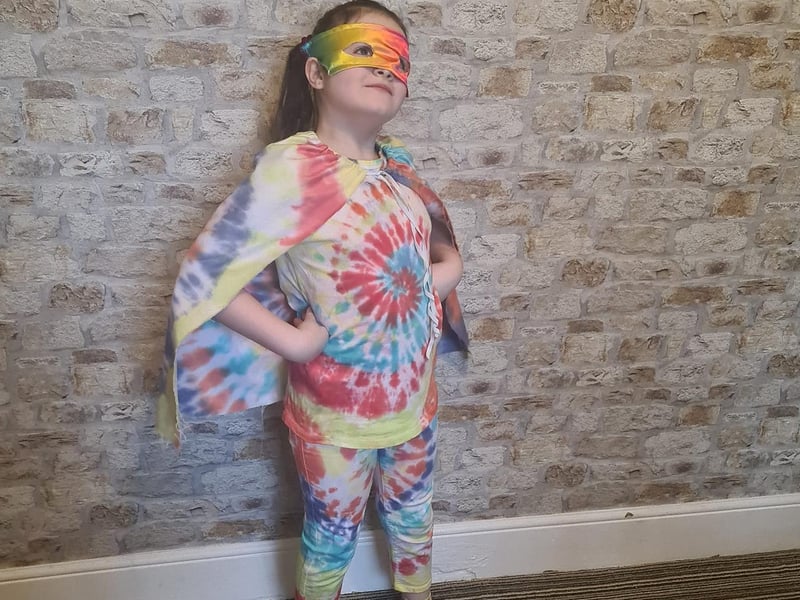 Danielle Jackson writes: "Elliemay Mccullagh, aged nine, as Rainbow Girl. She made the costume all by herself for superhero day at school."