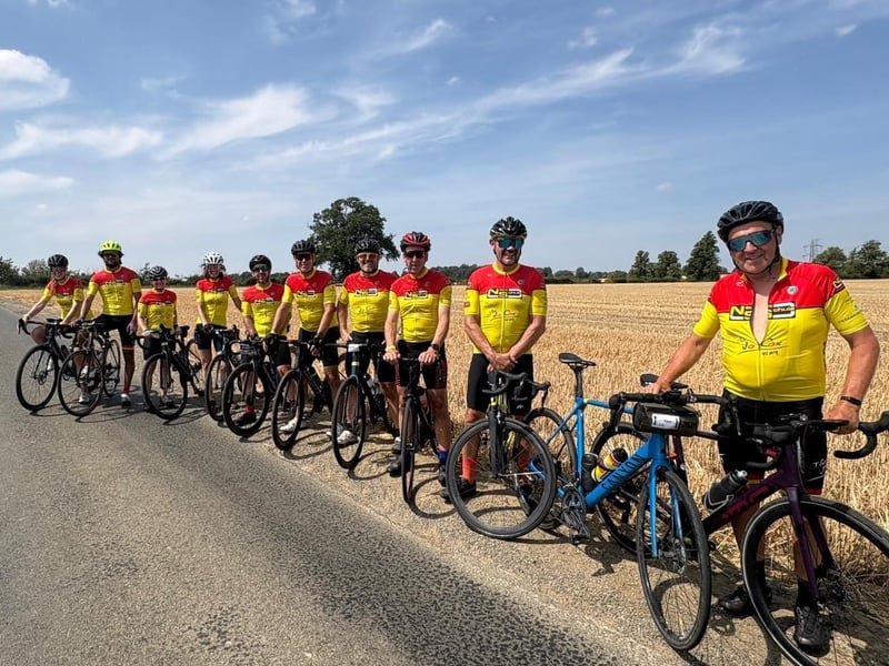 The riders in Northamptonshire, surrounded by wheat fields.