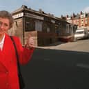 June Hancock celebrates her legal victory outside the outside the former J.W.Roberts Asbestos factory in Armley in the mid-1990s.