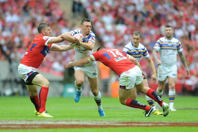 Rhinos' new number 13 is following in the footsteps of icon Kevin Sinfield, pictured during the 2015 Cup final win over Hull KR at Wembley. Picture by Steve Riding.