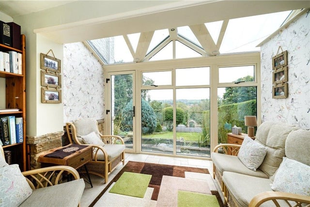 This sun room has far reaching views over the garden, river and beyond.