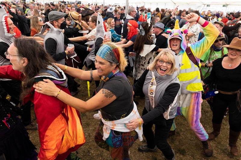 Doing the conga at the Lindisfarne Festival.