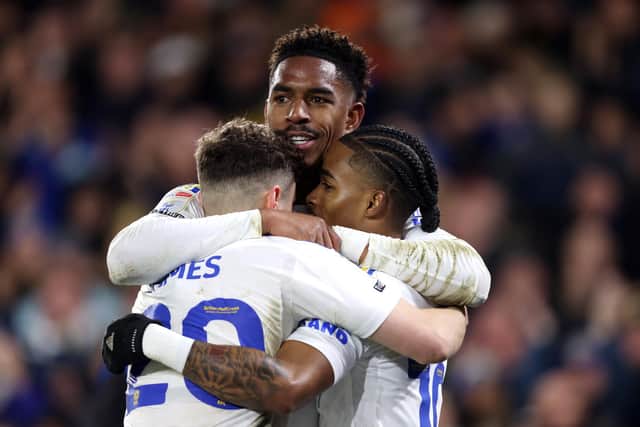 CHALLENGE: Issued to Leeds United left back Junior Firpo, top, pictured celebrating with goalscorers Crysencio Summerville, right, and Dan James, left, after Summerville's strike in the 3-0 victory against Championship visitors Birmingham City on New Year's Day. Photo by George Wood/Getty Images.