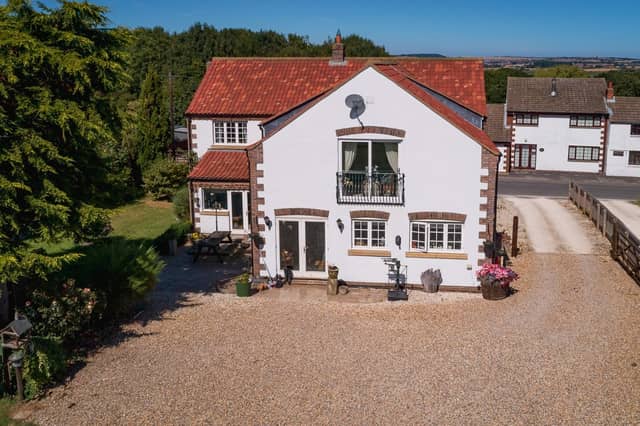 This impressive home carries a price tag of £850,000.