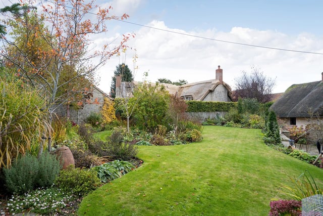 Stunning landscaped gardens include seating areas , ideal for al fresco dining in the summer.