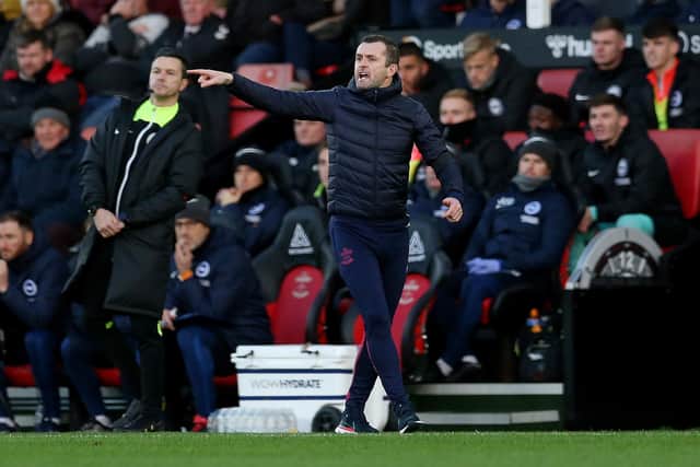 BOTTOM: Southampton under boss Nathan Jones, above, pictured during Boxing Day's defeat at home to Brighton.
Photo by Steve Bardens/Getty Images.