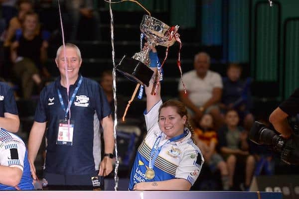 Jodie Boyd-Ward celebrates with the trophy after Rhinos' 2021 Grand Final success. Picture by Richard Blaxall/SWpix.com.