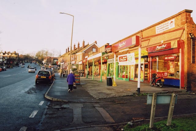 Harrogate Road, looking towards the Stainbeck Lane junction in 2003. On the left is a branch of Pizza Hut, this is number 34. In the same row is the Last Viceroy Indian restaurant, number 48.