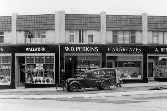 Stainbeck Corner in July 1939. Shops in focus are, on the left, Wallwork, selling clothing, then moving right, W.D. Perkins, bakers shop. A delivery van outside lists other branches at Moortown, Oakwood and Harehills. Then at number 3 is Hargreaves Coal Merchants, also agent for 'Zip' dry cleaning, partially seen to the right, number 2 A. Benton, shoe shop.