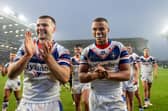 Max Jowitt and Corey Hall celebrate Wakefield Trinity's two-point victory at Leeds Rhinos in Betfred Super League round one. Picture by Allan McKenzie/SWpix.com.