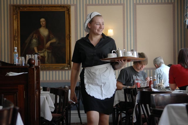Waitress Tiff Beeforth at Bothams' Edwardian tea room on Skinner Street in Whitby in July 2009.