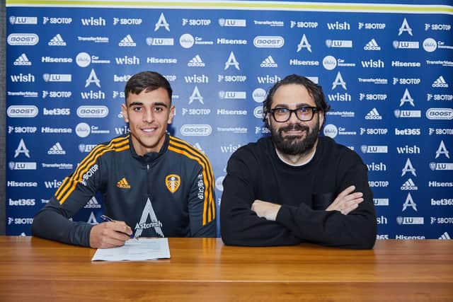 Diogo Monteiro signs for Leeds alongside director of football Victor Orta (Pic: Leeds United)