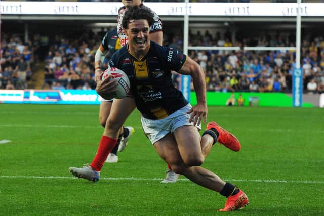Brodie Croft's 26th try of the season couldn't save Leeds Rhinos from a 20-16 home loss to Leigh Leopards. Picture by Steve Riding .