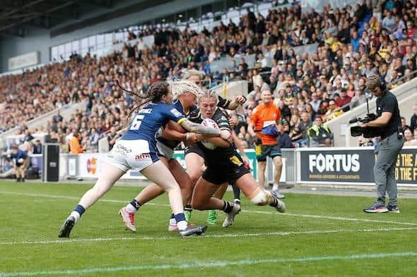 A Grand Final record crowd of 4,547 watch on as Tamzin Renouf scores York's first try agianst Leeds. Picture by Ed Sykes/SWpix.com.