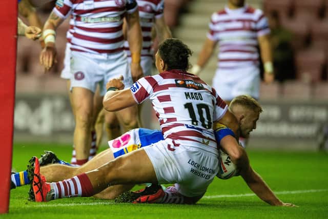 Jarrod O'Connor scores Rhinos' first try in last year's semi-final win at Wigan. Picture by Bruce Rollinson.