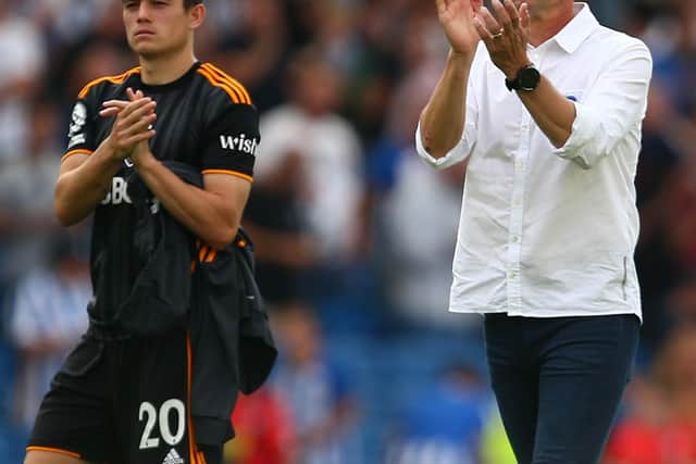 BRIGHTON, ENGLAND - AUGUST 27: Daniel James of Leeds United and Jesse Marsch, Manager of Leeds United, interact with the crowd following the Premier League match between Brighton & Hove Albion and Leeds United at American Express Community Stadium on August 27, 2022 in Brighton, England. (Photo by Charlie Crowhurst/Getty Images)
