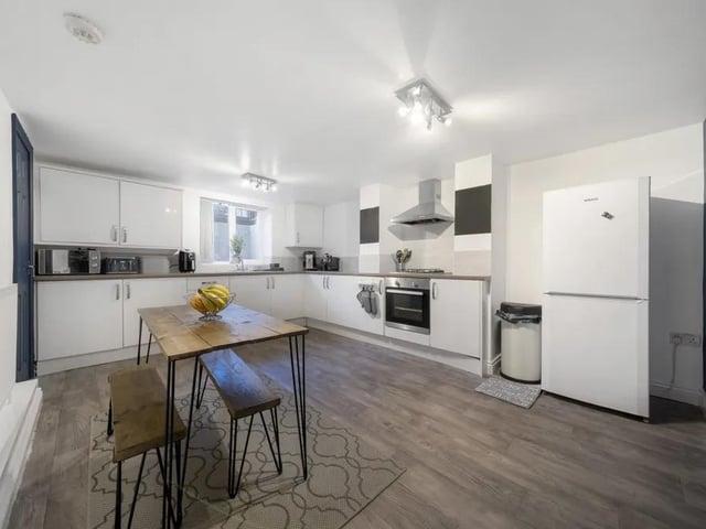 On the lower ground floor, there is a very large kitchen/ dining room. This is an alluring space, great for entertaining all ages.