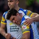 Brodie Croft celebrates with Jack Sinfield after scoring Leeds Rhinos' opening try in the win against London Broncos. Picture by Bruce Rollinson.