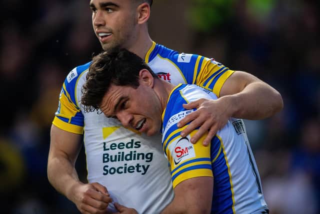 Brodie Croft celebrates with Jack Sinfield after scoring Leeds Rhinos' opening try in the win against London Broncos. Picture by Bruce Rollinson.