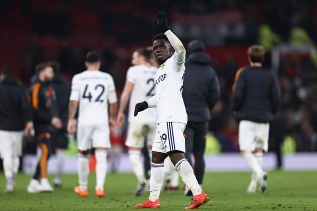 IT'S OKAY: The message from Willy Gnonto, above, pictured acknowledging Leeds United's travelling fans at Old Trafford after Wednesday night's thrilling 2-2 draw against arch rivals Manchester United. Photo by Naomi Baker/Getty Images.
