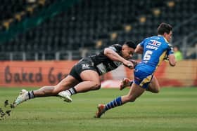 Brodie Croft, seen evading Hull FC's Franklin Pele, has been hugely influential for Leeds Rhinos this year. Picture by Alex Whitehead/SWpix.com.