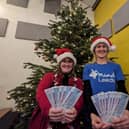 (L-R) Sophie Westmoreland and Gemma Green, fundraisers for Leeds Mind, with winter raffle tickets
