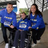 Kevin Sinfield, with best friend Rob Burrow and wife Lindsey. Photo: Steve Riding.