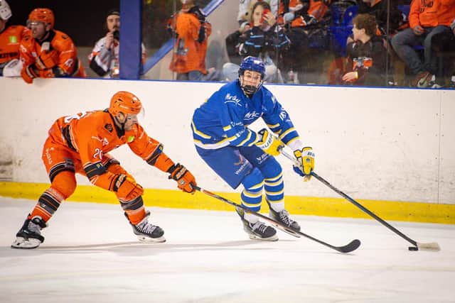 FINAL SHOWDOWN: Leeds Knights' Edgars Vengis (right) battles with Sheffield Steeldogs' Jonathan Phillips at Ice Sheffield on Wednesday night. Picture: Knights Media.
