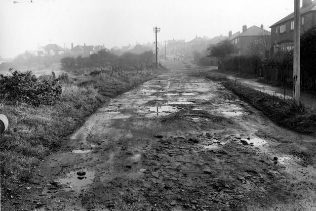 Looking East along Primley Park Lane towards Harrogate Road in October 1954.