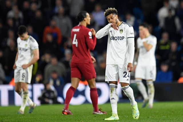 DISMAY: Shown by Leeds United's new record signing Georginio Rutter, right, as the Whites concede for a sixth time in Monday night's home hammering by Liverpool. 
Photo by OLI SCARFF/AFP via Getty Images.