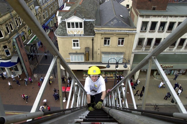 Leeds firefighters were raising funds for the Roy Castle Lung Cancer Foundation in Leeds city centre, by climbing the equivalent height of Mount Everest (29,028 feet) up a ladder at the side of Debenhams department store.