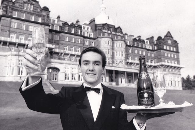This is waiter Mark Kirby who had shown a winning way with both the public and professionals in February 1987. He was a hit with customers at the Majestic Hotel where he had been promoted to junior head waiter before judges made him a finalist in the Young Waiter of the Year competition. He was born in Harrogate and attended the local Ashville College. He then trained at Scarborough Technical College, joined the Majestic Hotel in 1983, and then left two years later to travel around Europe. He returned five months later.
