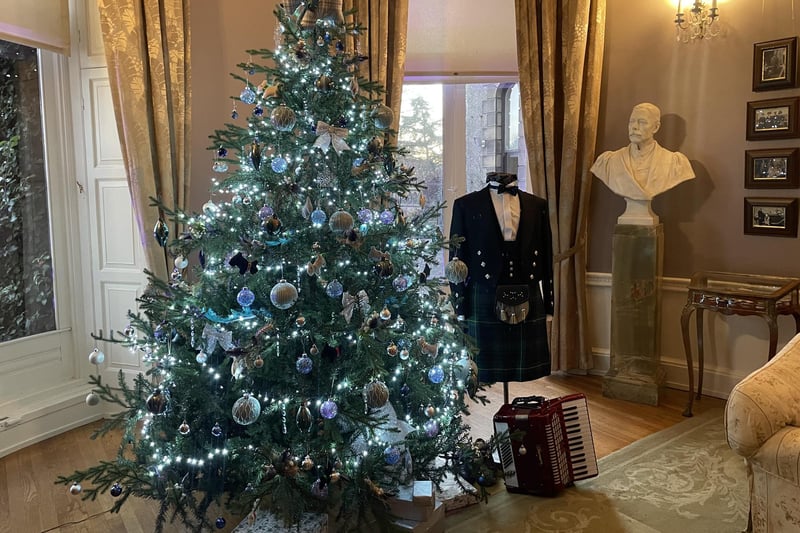 One of the rooms within the hall has been staged as 'The Boudoir'. The tree represents Craignish Castle in Scotland, which was bought in 1853 by Colonel Charles and Mary Isabella Gascoigne, who then owned Lotherton. Many parties would have been held there, especially at Christmas, when the men would wear the traditional Highland dress as displayed here.