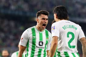 SEVILLE, SPAIN - OCTOBER 01: Marc Roca of Real Betis celebrates with teammate Hector Bellerin after scoring the team's second goal during the LaLiga EA Sports match between Real Betis and Valencia CF at Estadio Benito Villamarin on October 01, 2023 in Seville, Spain. (Photo by Fran Santiago/Getty Images)
