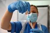 Who gets the Covid vaccine first is determined by a nine-group priority list (Getty Images)