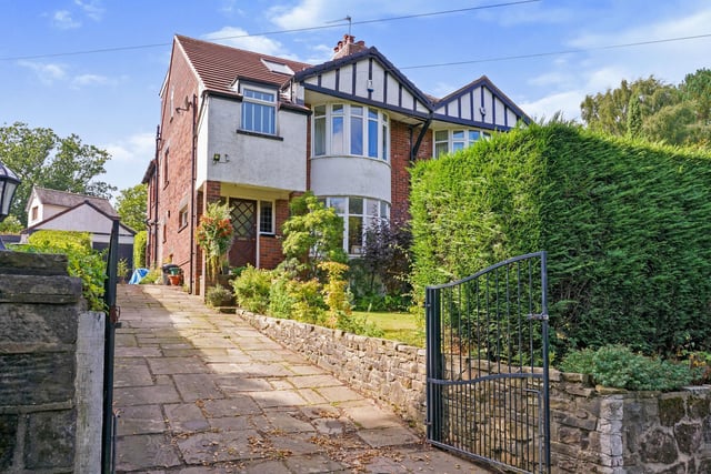 The house enjoys an elevated position off Leeds Road with far reaching views across Wharfe Valley, and is within walking distance of Bramhope village centre and the local primary school.