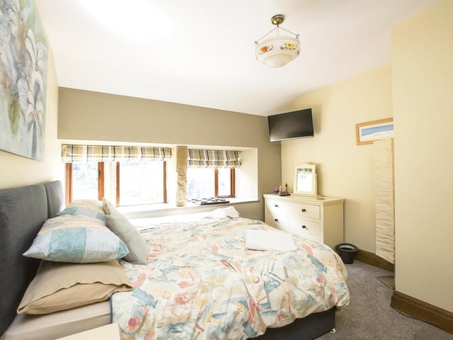 Natural light pours in to this room from the many windows.