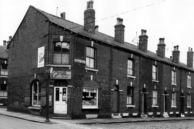 Cardwell Terrace and Main Road in August 1966. On the left of this view is Cyril's greengrocery, which also sells fish, fruit and flowers. This was number 10 Main Road. Cardwell Street runs to the right edge, numbers 3 to 9 are in view. These houses awaited demolition in line with the citywide slum clearance programme.
