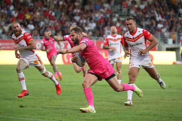 Aidan Sezer scores the golden-point winning try for Rhinos at Catalans last July. Picture by Manuel Blondeau/SWpix.com.