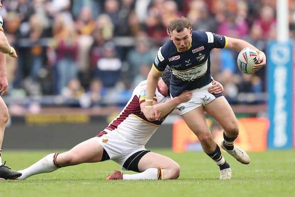 Cameron Smith, pictured taking on Huddersfield's Chris Hill, is a possible option to play at stand-off against Salford. Picture by John Clifton/SWpix.com.